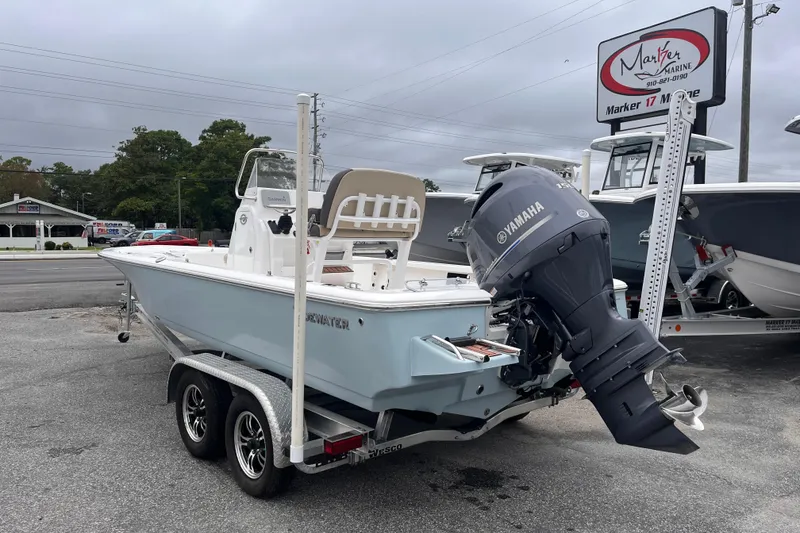 Slide: The Image of 2022 Tidewater 2110 Bay Max boat with Yamaha engine on trailer at dealership. - 2