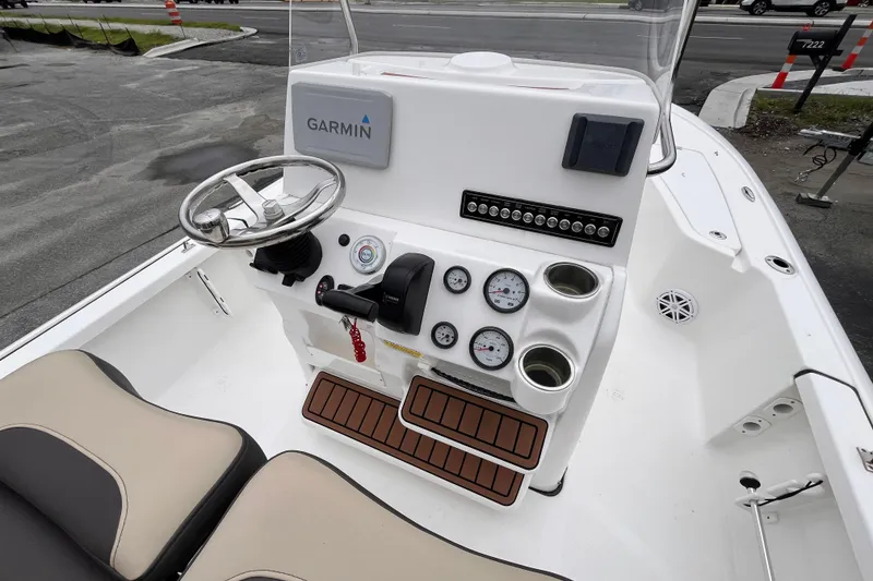 Slide: The Image of 2022 Tidewater 2110 Bay Max boat console with Garmin navigation and gauges. - 8