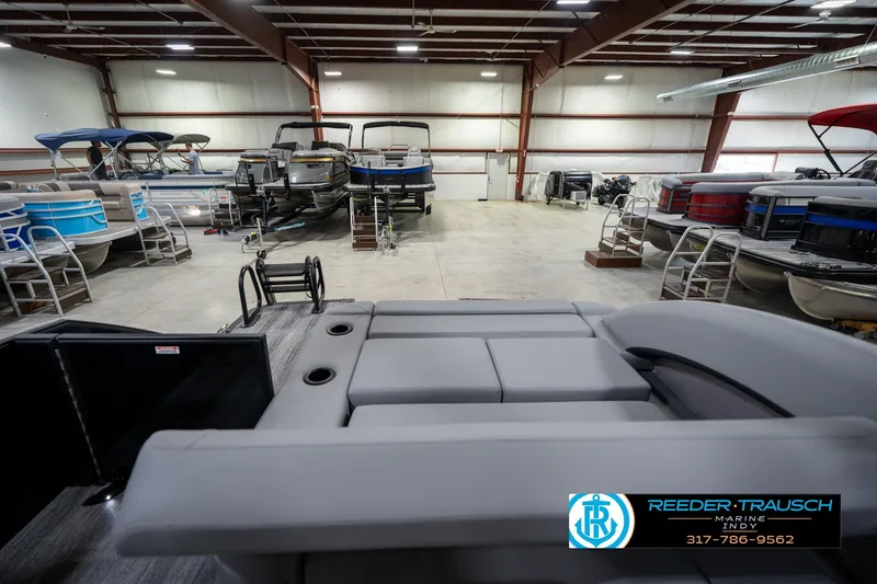 Slide: The Image of 2026 Bennington 26 MSB pontoon boat interior with spacious seating and modern design. - 17