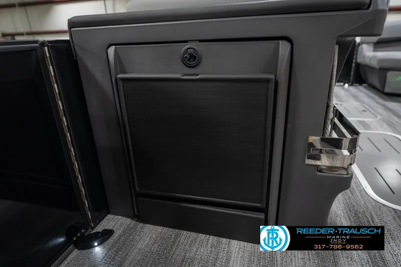 Slide: The Image of Luxurious interior of 2026 Bennington 26 MSB boat with quilted seating and cup holder. - 28