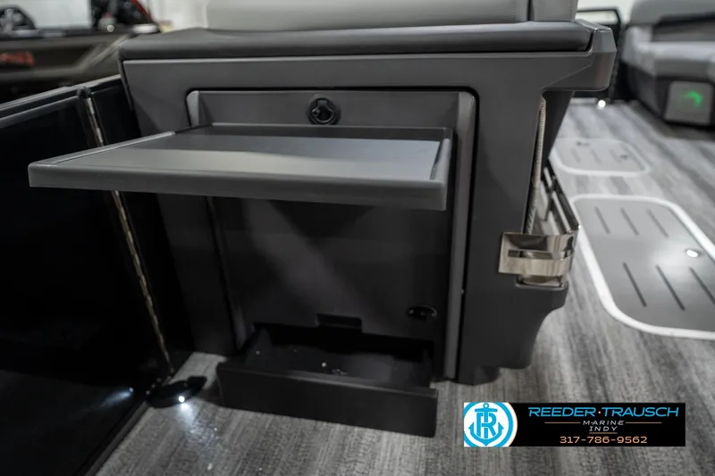Slide: The Image of 2026 Bennington 26 MSB boat interior storage compartment with sleek design and modern finish. - 30
