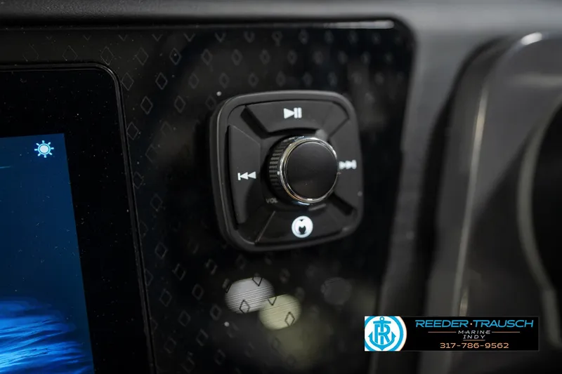 Slide: The Image of 2026 Bennington 26 MSB boat dashboard with modern steering wheel and digital displays. - 34