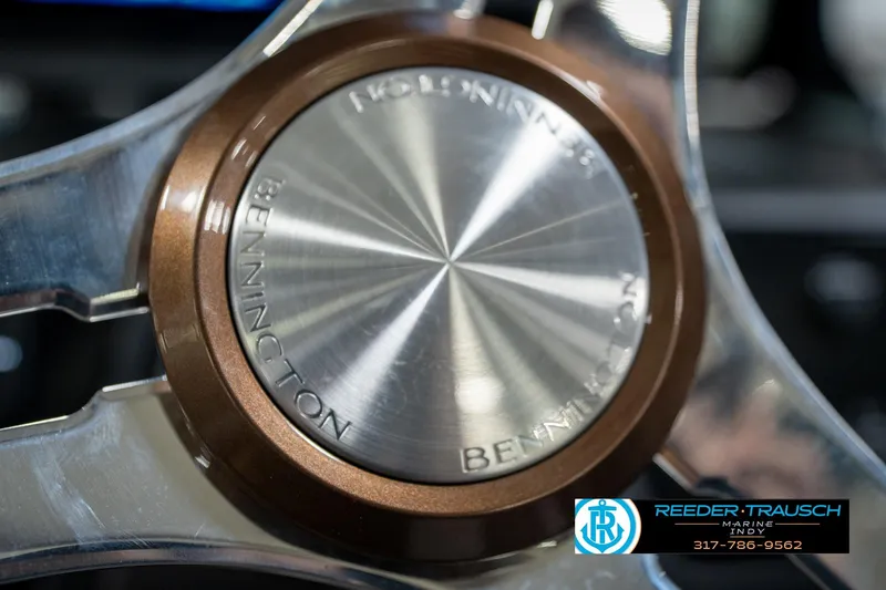 Slide: The Image of Garmin display on 2026 Bennington 26 MSB boat dashboard, Reeder-Trausch Marine branding. - 38