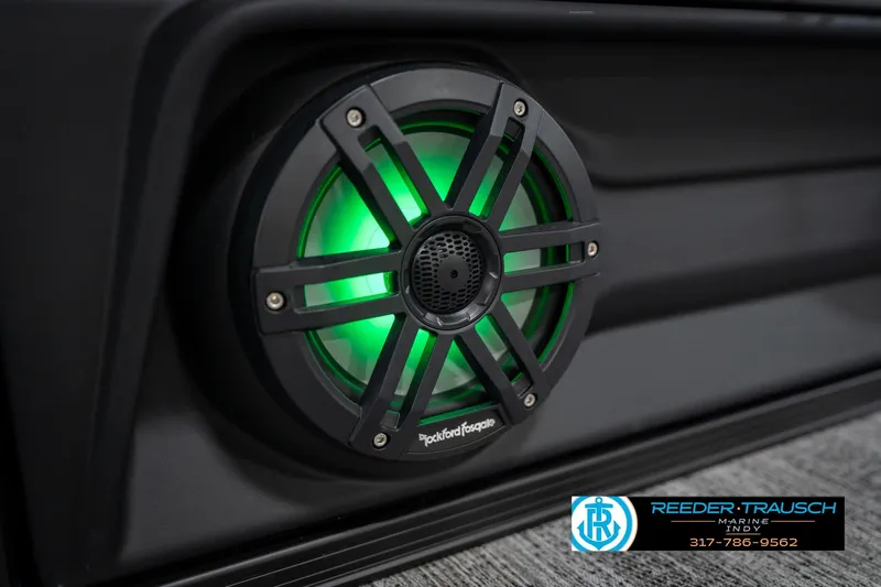 Slide: The Image of Illuminated panel on 2026 Bennington 26 MSB boat, featuring green light design. - 46