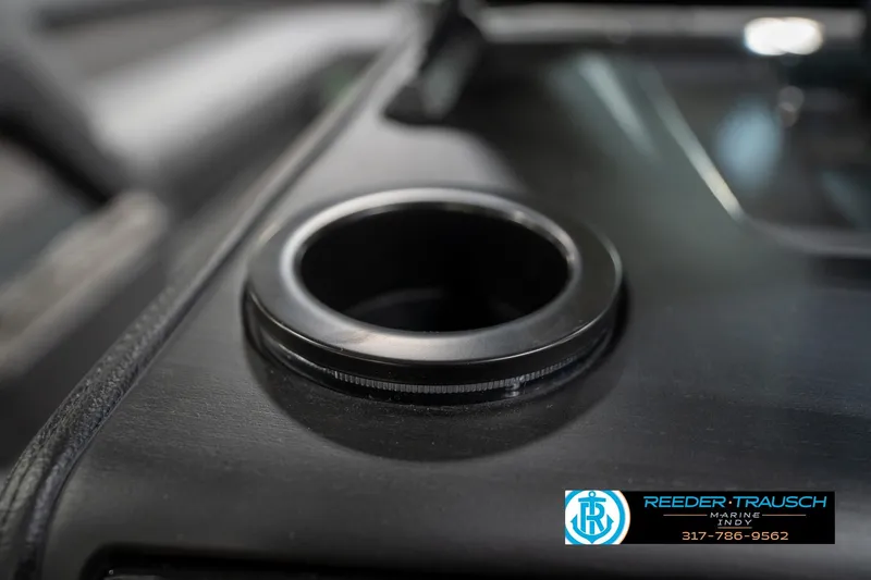 Slide: The Image of Close-up of a Rockford Fosgate speaker with green lighting on a 2026 Bennington 26 MSB. - 47