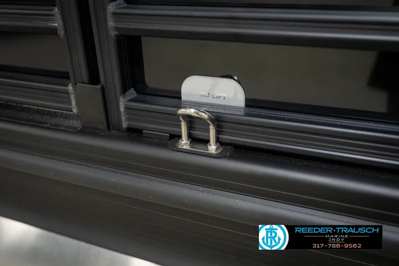 Slide: The Image of 2026 Bennington 26 MSB boat deck detail with cleat, Reeder-Trausch Marine logo. - 57