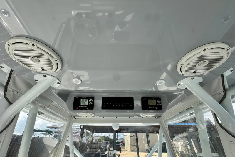 Slide: The Image of Interior view of a 2018 Freeman 42 LR boat with speakers and control panels. - 26