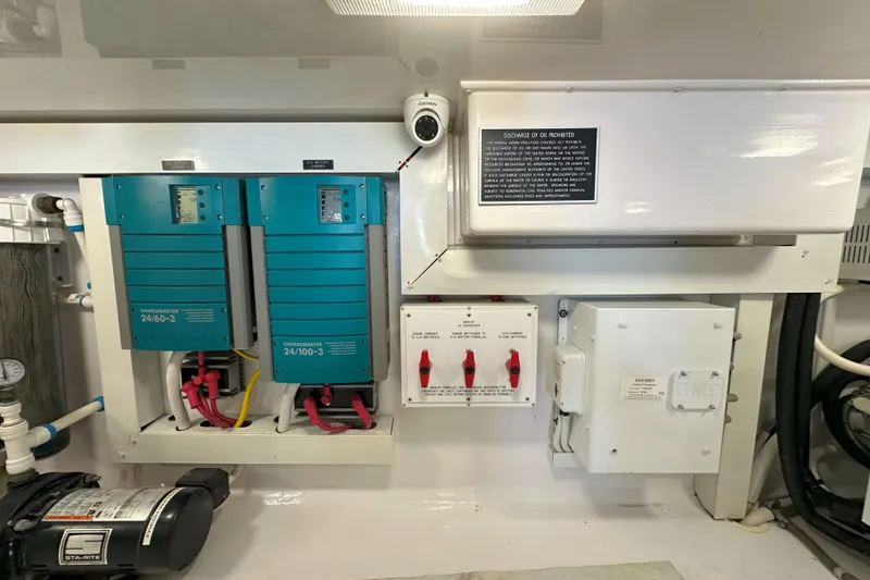 Slide: The Image of Luxurious bathroom in 2003 Viking 48 Convertible yacht with shower, toilet, and vanity. - 27