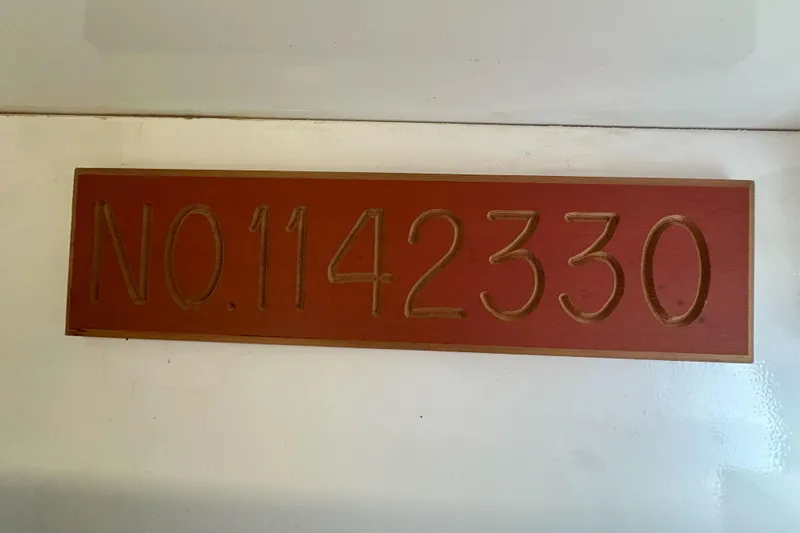 Slide: The Image of Laundry area in 2003 Viking 48 Convertible yacht with stacked washer and dryer. - 30