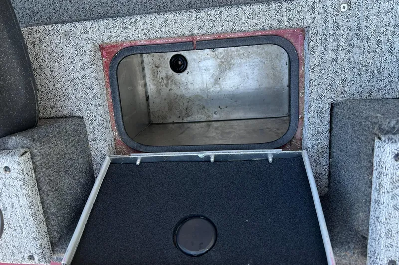 Slide: The Image of 2021 Tracker Pro Team 175 TXW Tournament Edition storage compartment interior. - 14
