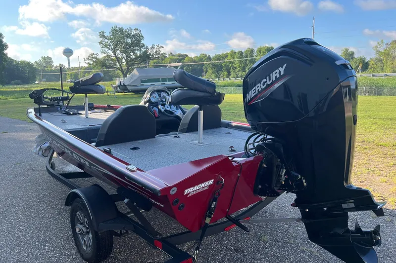 Slide: The Image of 2021 Tracker Pro Team 175 TXW Tournament Edition boat with Mercury engine on trailer. - 5