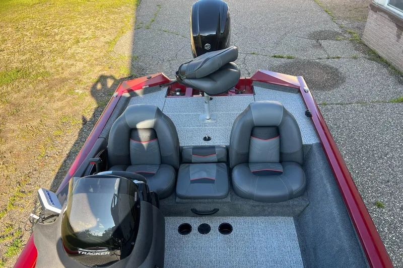 Slide: The Image of 2021 Tracker Pro Team 175 TXW Tournament Edition boat with gray seating and red accents. - 7