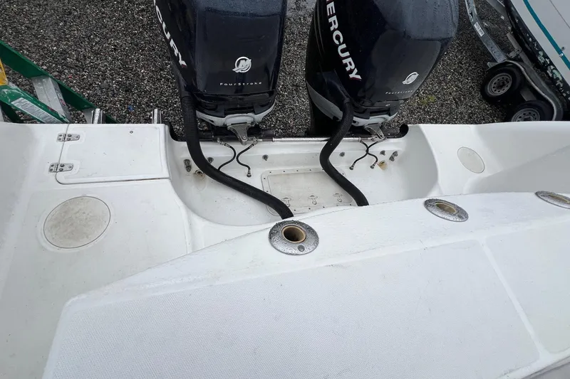 Slide: The Image of 2005 Boston Whaler 305 Conquest boat with dual Mercury FourStroke engines. - 17