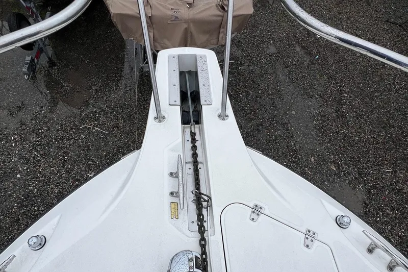 Slide: The Image of Bow of a 2005 Boston Whaler 305 Conquest with anchor chain and deck details. - 20