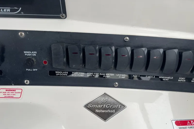 Slide: The Image of Control panel of a 2005 Boston Whaler 305 Conquest boat with SmartCraft system. - 30