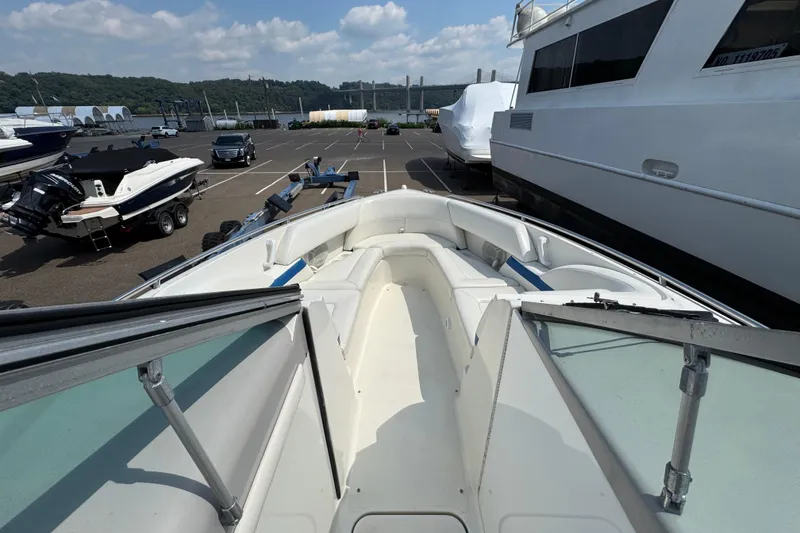 Slide: The Image of 2001 Formula 280 Bowrider boat interior with steering wheel and dashboard controls. - 12