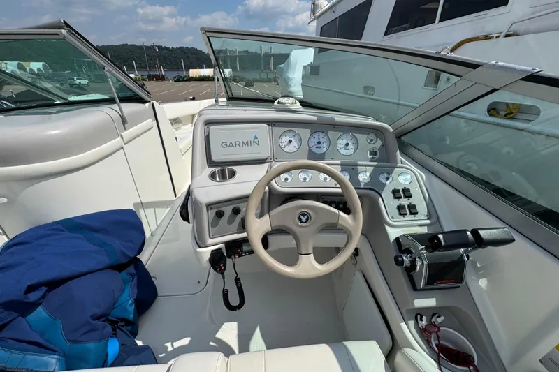 Slide: The Image of 2001 Formula 280 Bowrider boat interior with white and blue seating. - 18