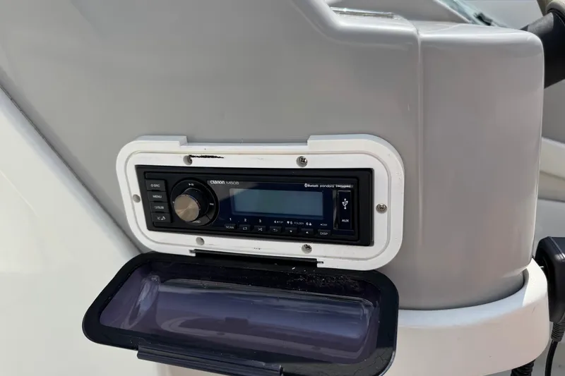 Slide: The Image of Interior of 2001 Formula 280 Bowrider boat with sink and portable toilet. - 26