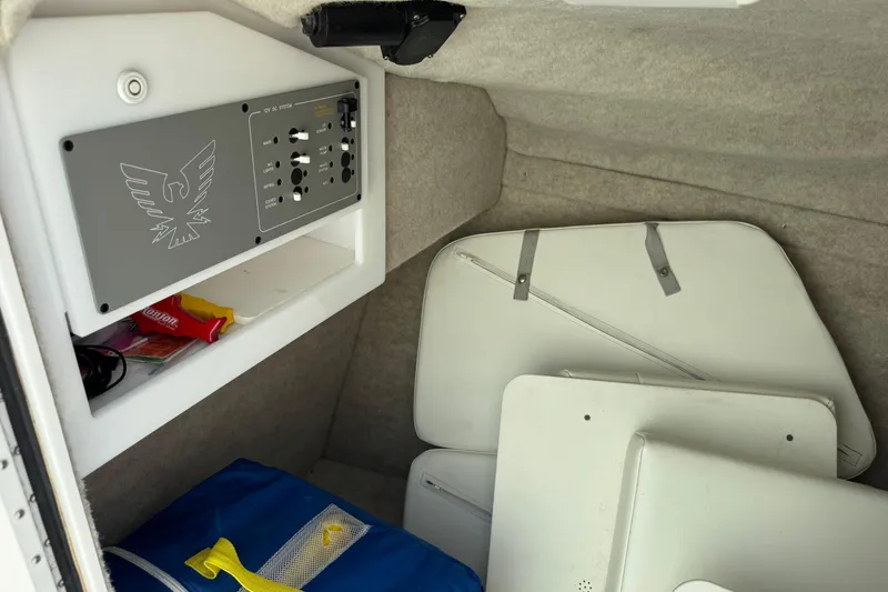 Slide: The Image of 2001 Formula 280 Bowrider bathroom with sink, mirror, and storage cabinets. - 27