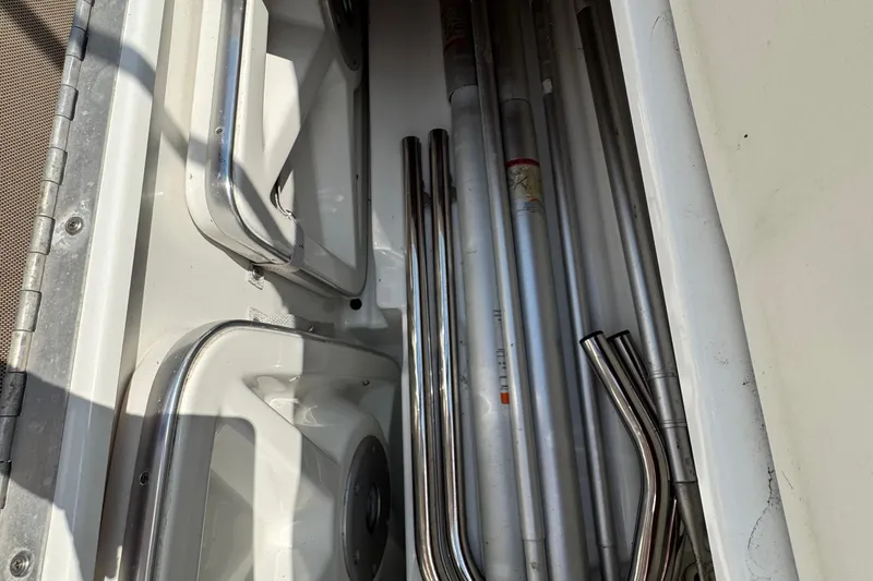 Slide: The Image of Open storage compartment on 2001 Formula 280 Bowrider boat deck. - 32