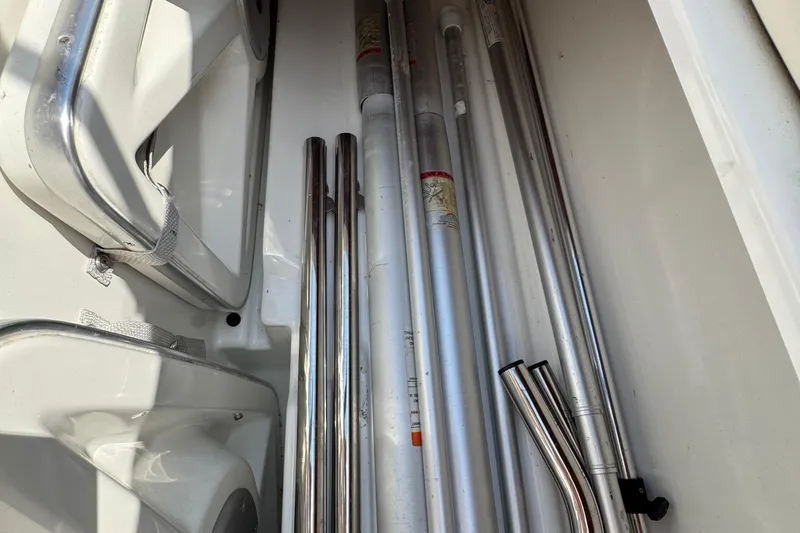 Slide: The Image of Interior view of a 2001 Formula 280 Bowrider boat storage compartment. - 33