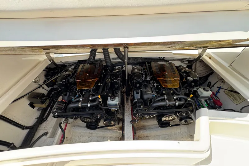 Slide: The Image of Storage compartment of a 2001 Formula 280 Bowrider with metal poles and accessories. - 35