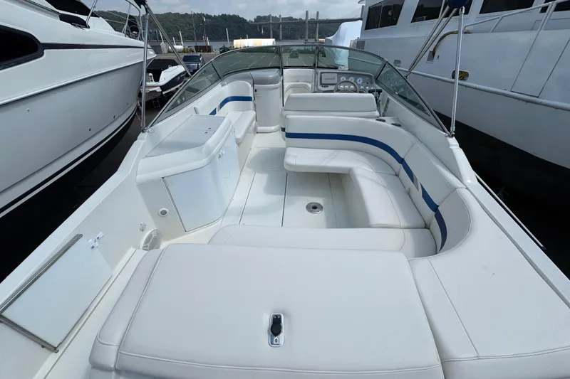 Slide: The Image of Rear view of a 2001 Formula 280 Bowrider boat with swim platform and ladder. - 8