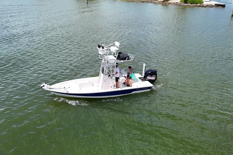 The Image of 2006 Pathfinder 2200 Tournament Edition boat on water with passengers. - 1