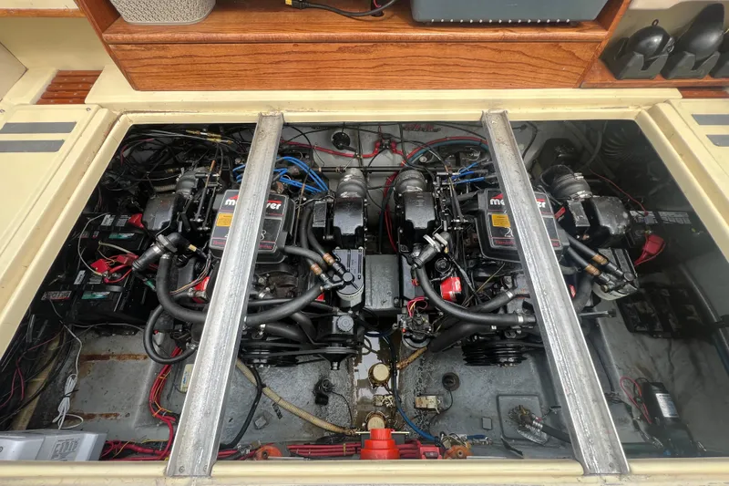 Slide: The Image of Engine compartment of a 1986 Sea Ray 270 Amberjack with twin MerCruiser engines. - 23