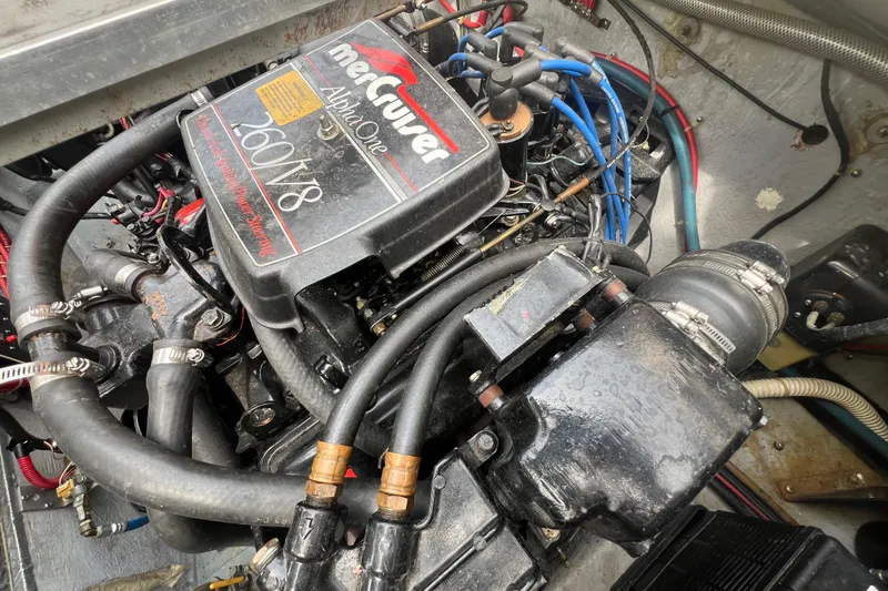 Slide: The Image of Engine compartment of 1986 Sea Ray 270 Amberjack with MerCruiser Alpha One V8 engine. - 24