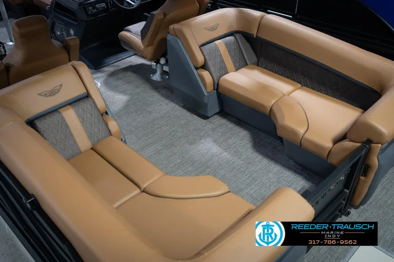 Slide: The Image of Luxurious interior of 2026 Bennington 22 MFB pontoon boat with tan seating and modern design. - 13