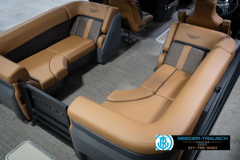 Slide: The Image of Luxurious interior of 2026 Bennington 22 MFB pontoon boat with tan leather seating. - 14