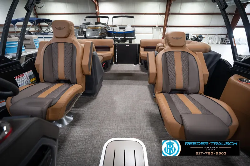 Slide: The Image of 2026 Bennington 22 MFB boat interior with luxurious seating and modern design. - 16