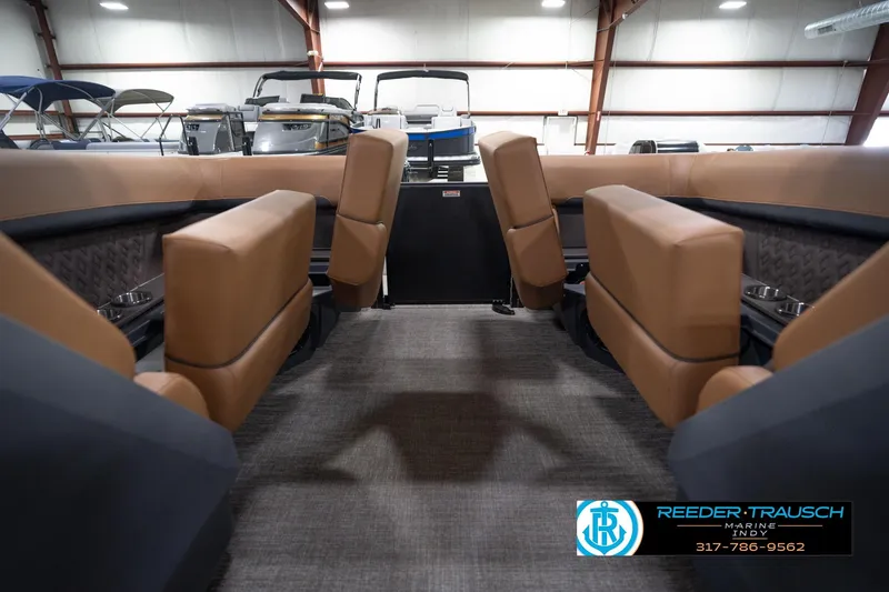 Slide: The Image of Interior of 2026 Bennington 22 MFB boat with tan seating and modern design. - 26