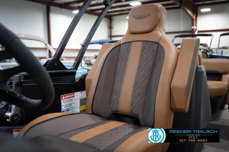 Slide: The Image of Luxurious interior of 2026 Bennington 22 MFB boat with premium seating and elegant design. - 39