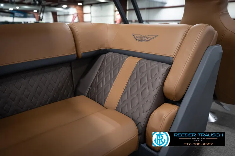 Slide: The Image of Luxurious seating in the 2026 Bennington 22 MFB boat, featuring elegant tan and gray upholstery. - 40