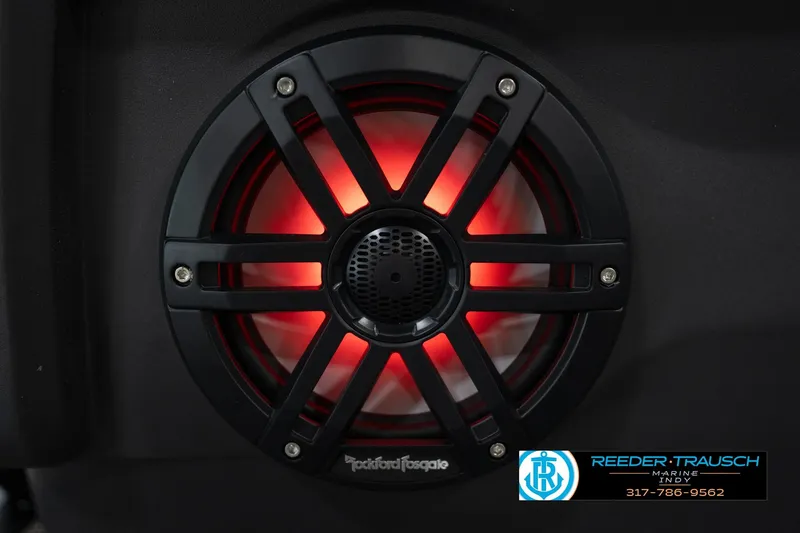 Slide: The Image of Red-lit speaker on 2026 Bennington 22 MFB boat, featuring Rockford Fosgate audio. - 43
