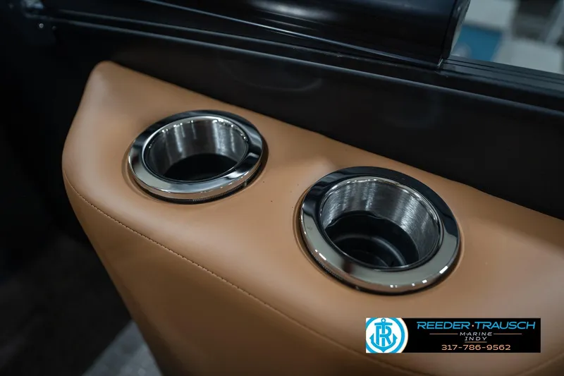 Slide: The Image of Cup holders in the 2026 Bennington 22 MFB boat interior, featuring sleek design. - 46