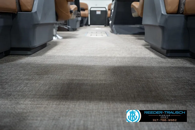 Slide: The Image of Interior view of 2026 Bennington 22 MFB boat with carpeted flooring and seating. - 48