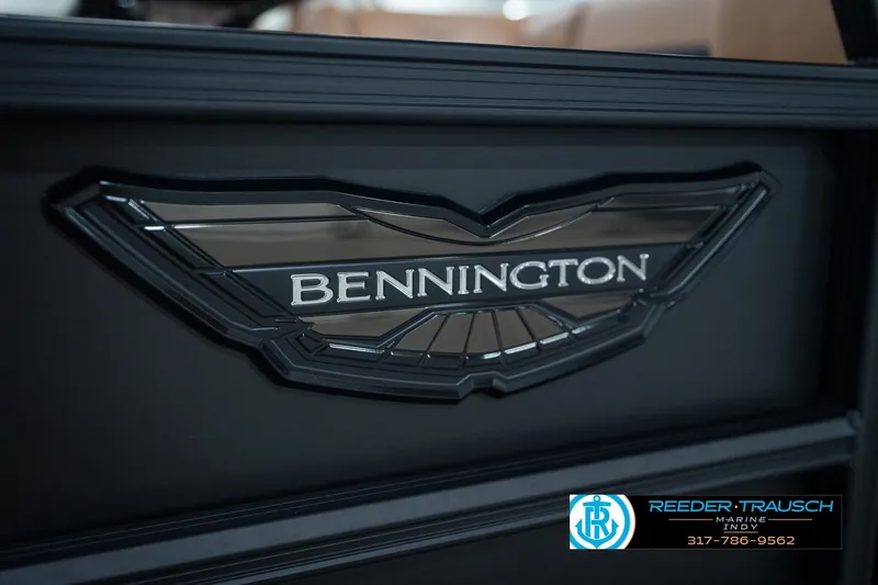 Slide: The Image of 2026 Bennington 22 MFB logo on a sleek black surface. - 49