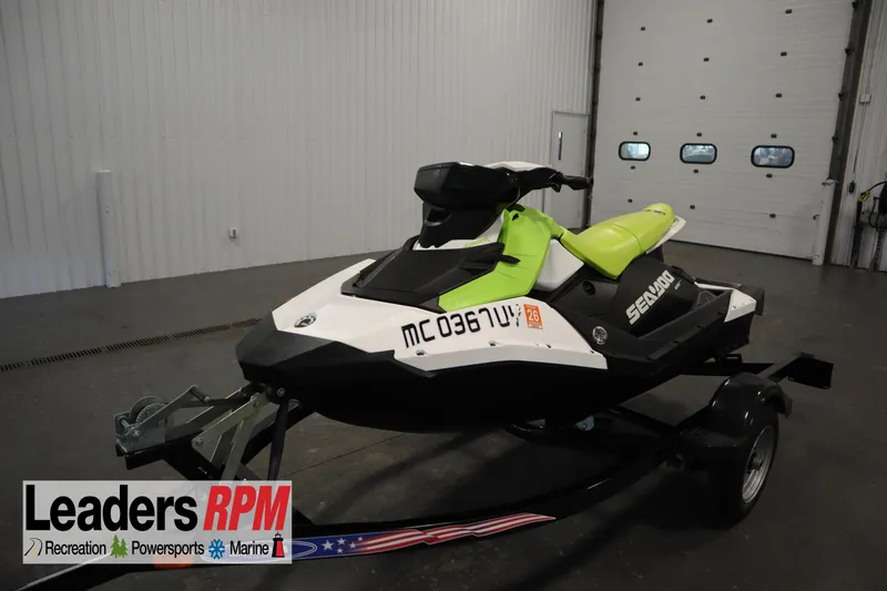 Slide: The Image of 2023 Sea-Doo SPARK 3 IBR CONV SS jet ski on trailer in showroom. - 30