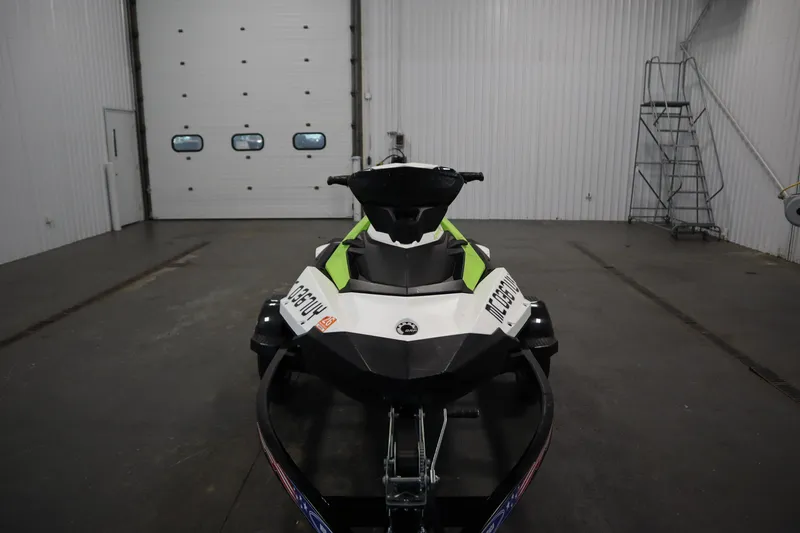 Slide: The Image of 2023 Sea-Doo SPARK 3 IBR CONV SS in a spacious indoor garage. - 31