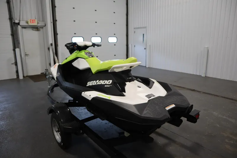 Slide: The Image of 2023 Sea-Doo SPARK 3 IBR CONV SS jet ski on trailer in garage. - 36