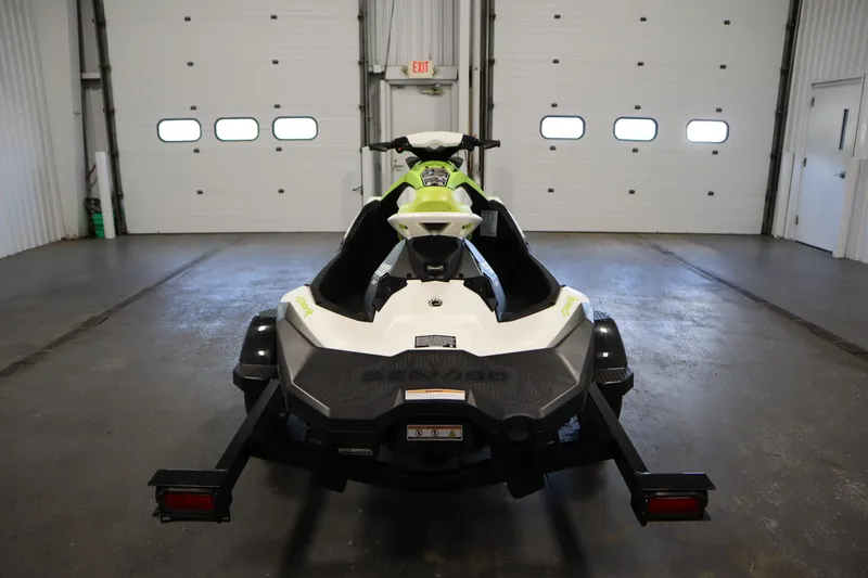 Slide: The Image of 2023 Sea-Doo SPARK 3 IBR CONV SS in a garage, rear view on trailer. - 6