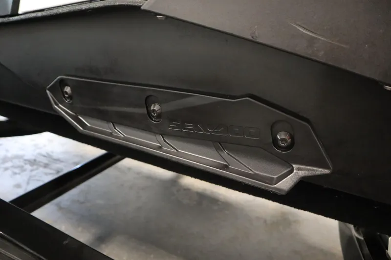 Slide: The Image of 2023 Sea-Doo Spark 3up on trailer in garage setting. - 22