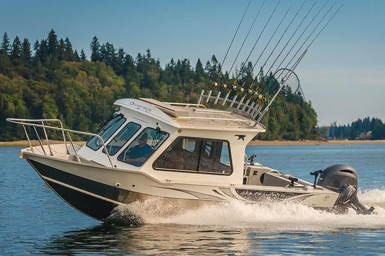 Slide: The Image of 2026 Duckworth 24 Pacific Pro boat on trailer under clear blue sky. - 3