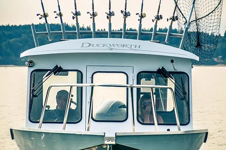 Slide: The Image of Interior view of 2026 Duckworth 24 Pacific Pro boat, showcasing spacious seating and modern design. - 9