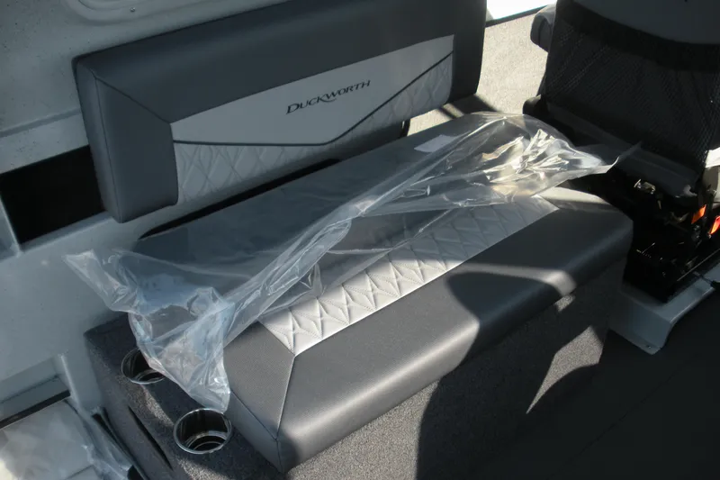 Slide: The Image of Control panel of 2026 Duckworth 26 Pacific Pro boat with throttle and switches. - 10