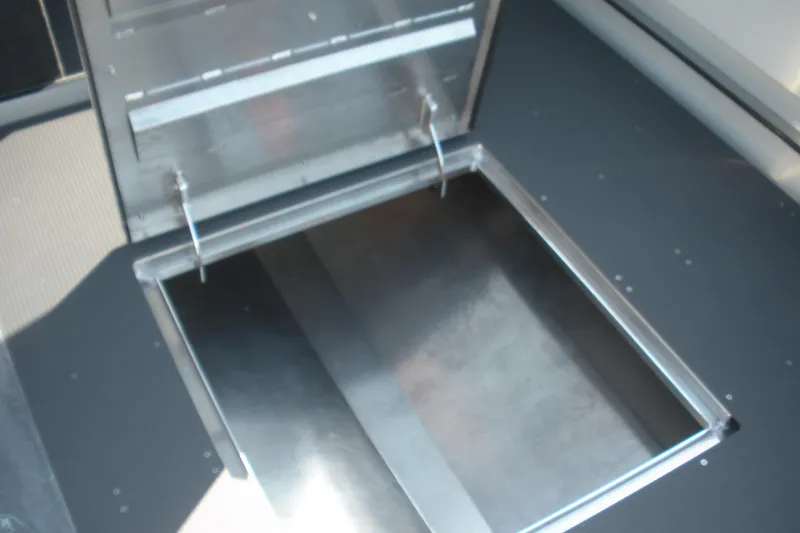 Slide: The Image of Interior storage compartment of 2026 Duckworth 26 Pacific Pro boat. - 14