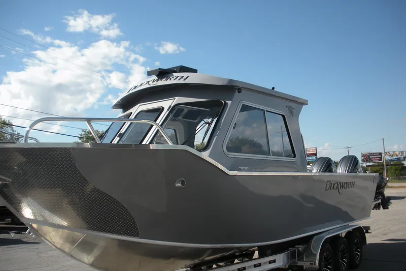 Slide: The Image of 2026 Duckworth 26 Pacific Pro boat at Happy Days Boating, on trailer. - 2